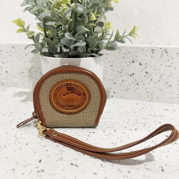 Dooney & Bourke Handbags - Dooney & Bourke Coin Zip Around duck Pouch leather